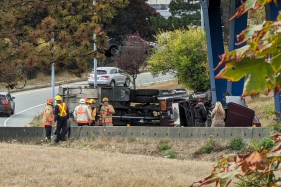 A truck overturned near the Quadra Street off-ramp on Highway 17. (Screenshot/@ChillAsHellYYJ/Twitter) 