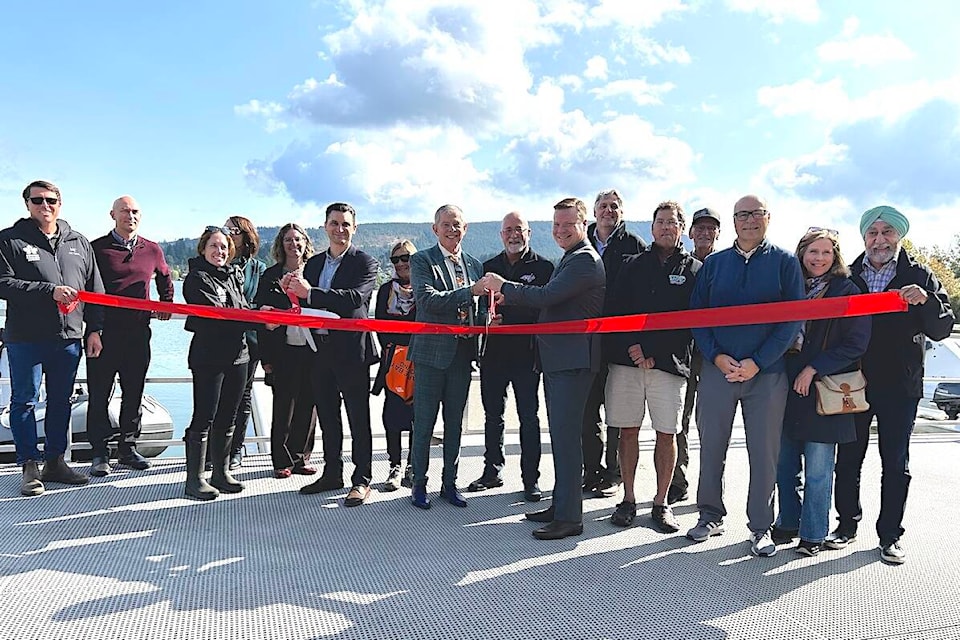 Dignitaries gather for the official ribbon cutting during the grand opening of the National Training Centre docks ahead of the 2023 National Rowing Championships on Quamichan Lake Thursday, Sept. 28. (Sarah Simpson/Citizen) 