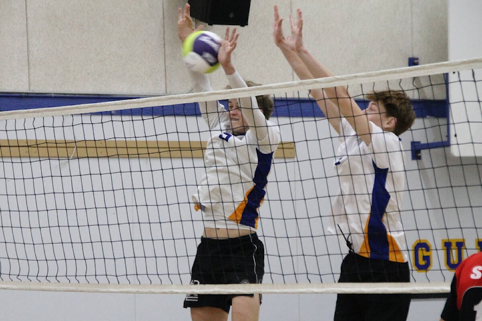 Vernon Christian School Royals blockers Jack Johnson (left) and Skylar Donnelly deny a Revelstoke Avalanche kill attempt during the Royals’ Tri Lakes Invitational Senior Boys high school volleyball tournament Friday, Sept. 22. (Roger Knox - Morning Star) 