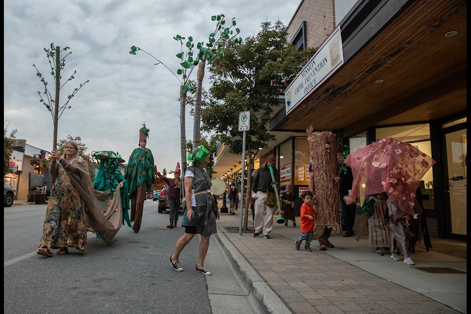 Runaway Moon Theatre’s Walk of the Woods Tree Parade strolled down First Avenue on Friday evening (Sept. 22) prior to a reception revealing Mission’s Forest Downtown Banner Project. /Bob Friesen Photo 