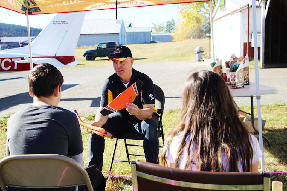 100 Mile Flying Club member Markus Springmann teaches a ground school class for young aviators on Saturday, Oct. 18, during the club’s 10th Annual Junior Aviator Day. (Patrick Davies photo - simplymastery) 