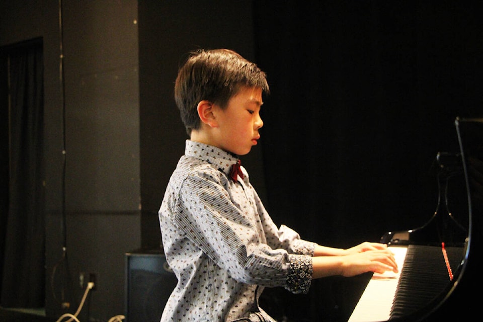 Edward Yang was one of several children who played the piano at the 100 Mile Festival of the Arts in April 2023. (Patrick Davies photo - simplymastery) Edward Yang was one of several children who played the piano at the 100 Mile Festival of the Arts last Saturday. (Patrick Davies photo - simplymastery) 