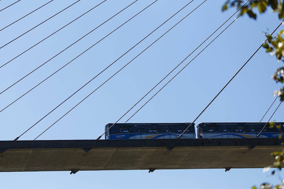 A SkyTrain travelling across the SkyBridge in Surrey on Aug. 6, 2022. (Anna Burns/Surrey Now-Leader) 
