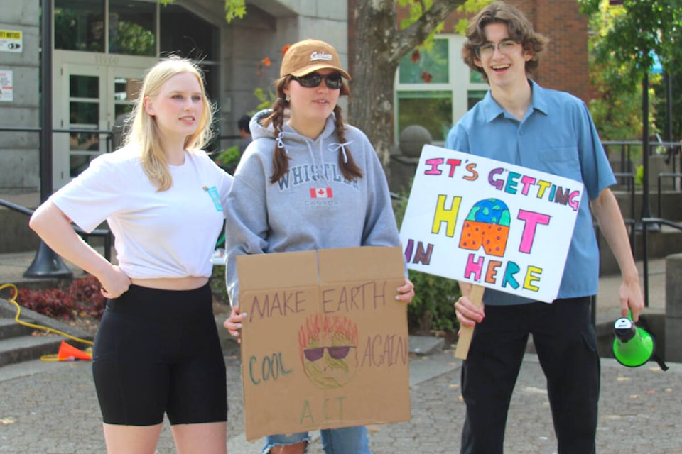 Hudson Campbell (right) helped organize the March to End Fossil Fuels in Maple Ridge on Sept. 17. (Gabe Liosis/Special to The News) 