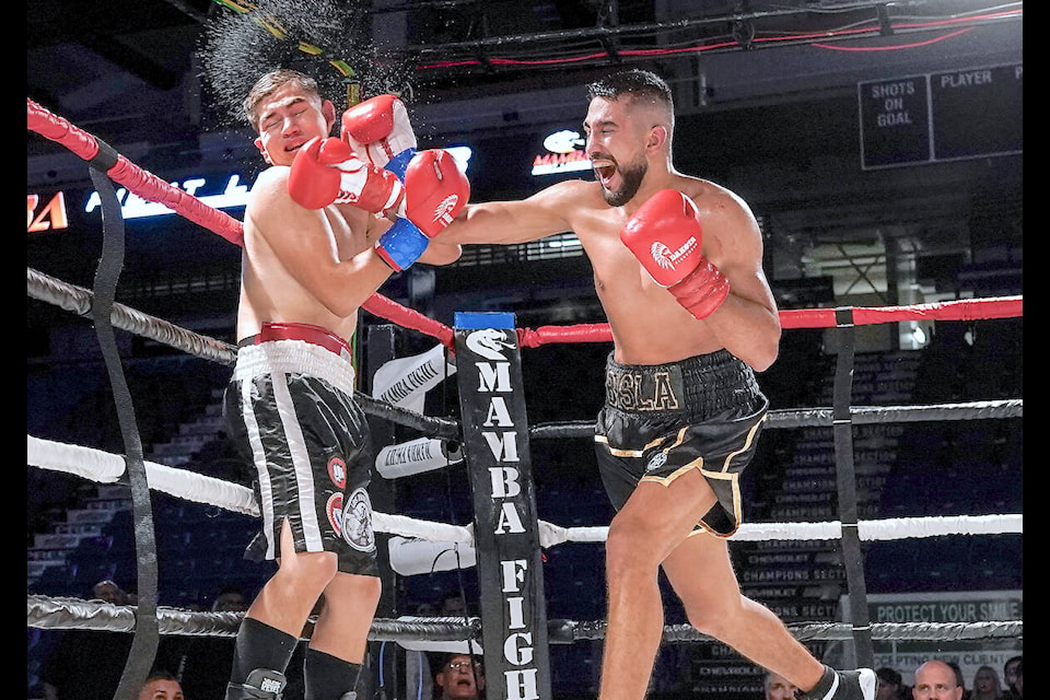 Buneet Bisla punched Brayan Pintor at Mamba Fight League 13, at the Langley Events Centre on Friday, Sept. 29. (Wes Shaw/ ShotBug Press/Special to Langley Advance Times) 