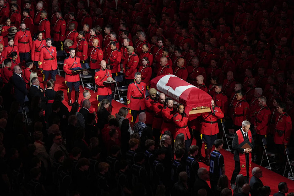 Pallbearers carry RCMP Const. Rick O’Brien’s casket into a regimental funeral in Langley, B.C., on Wednesday, Oct. 4, 2023. (Darryl Dyck/Canadian Press) 