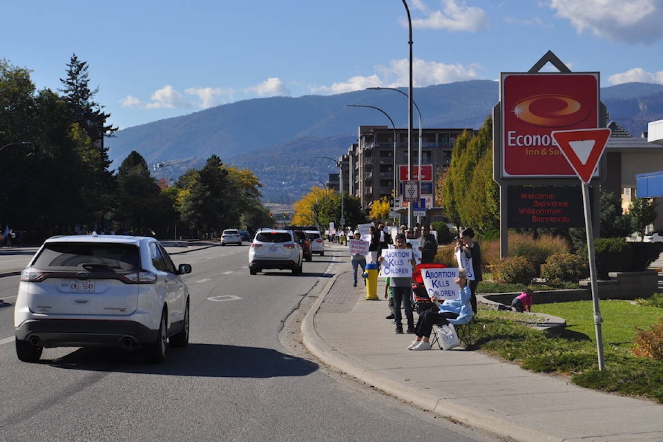 About 200 people lined Harvey Ave. in Kelowna on Oct. 1, 2023 for an anti-abortion protest. (Brittany Webster/Capital News) 