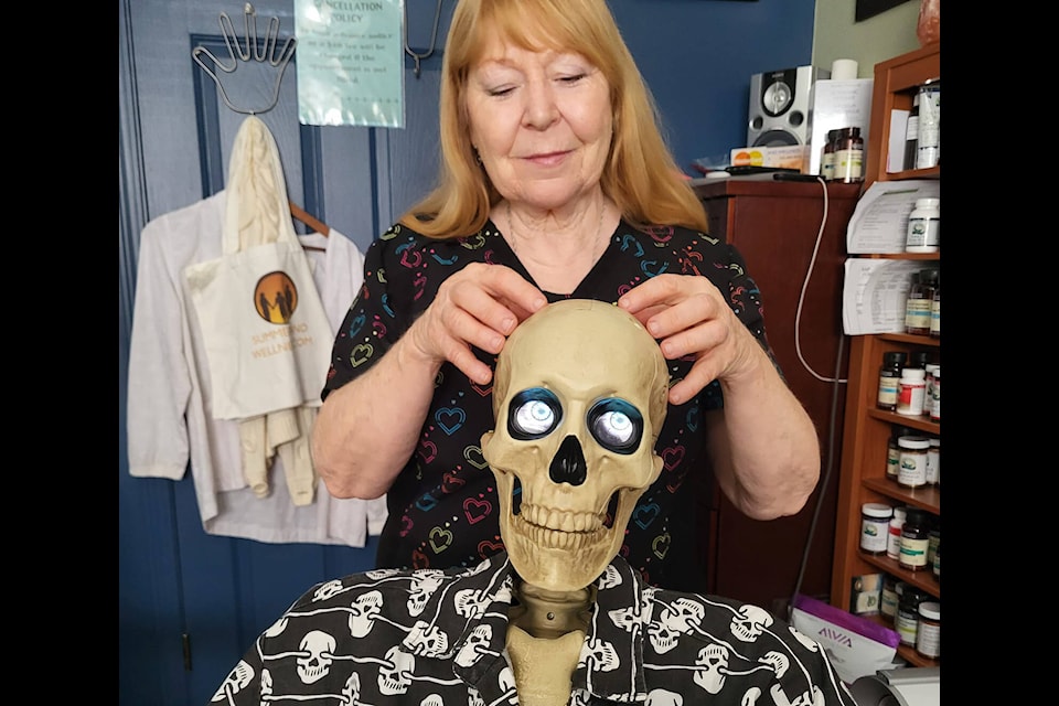 Slim the skeleton loved his skull massage so much at Summerland Health and Wellness Centre his eyes rolled back in his head. (Peskelly Facebook) 
