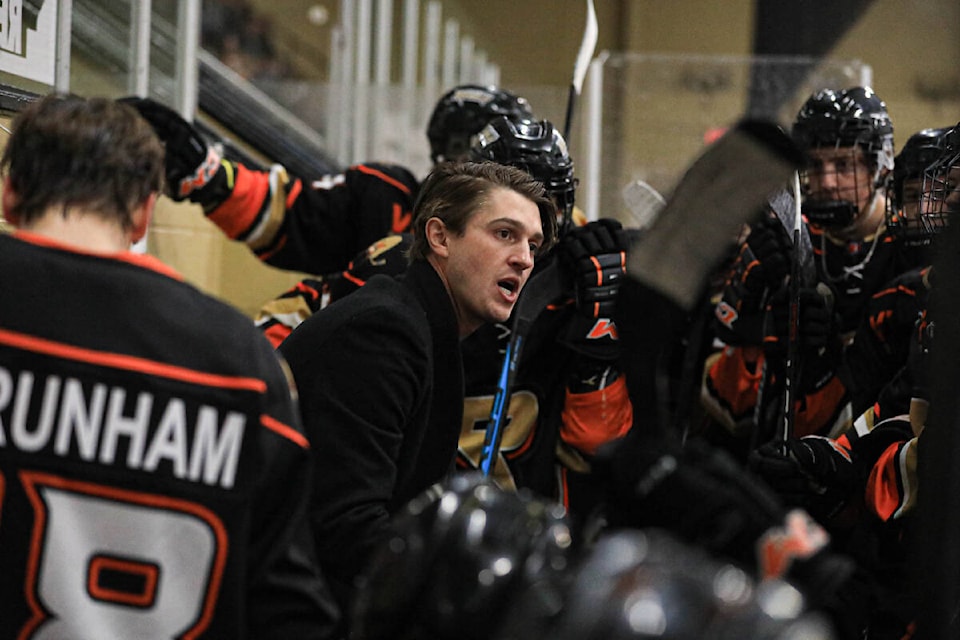 Former Castlegar Rebels Head Coach Nick Headrick talks to the team at a 2023 game. (Jennifer Small)