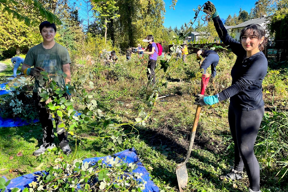 A total of 29 volunteers gathered at Reg Franklin Park on Oct. 7 to help the Lower Mainland Green Team remove invasive blackberry bushes. (Lower Mainland Green Team/Special to The News) 