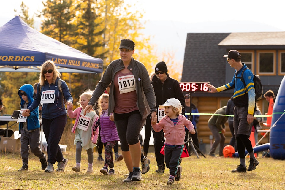 Liz and daughter Hannah Watson and other families do the Reino Run together at Larch Hills on Sunday, Oct. 15, 2023. (Kayleigh Seibel Photography) 