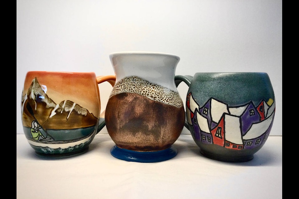 These handpainted mugs by Werner Ostermann will be part of the Clay Hub’s one-day Christmas sale on Nov. 4, 2023. (Submitted photo) 
