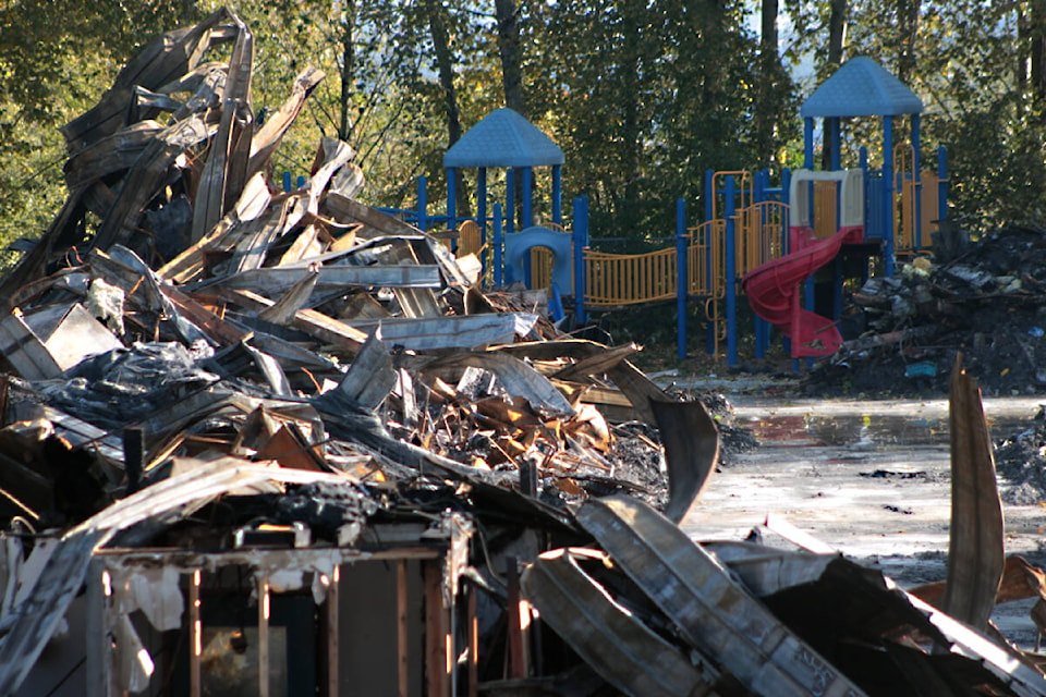 A playground remains unscathed at Port Coquitlam’s Hazel Trembath Elementary School which burned down in the early hours of Oct. 14, 2023. Coquitlam RCMP say the fire is still considered suspicious, but determining the cause could take months. (Lauren Collins) 