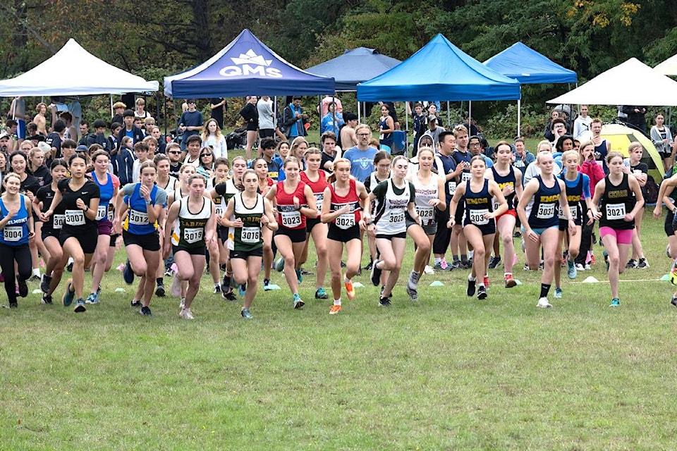 The senior girls take off at the start of the their race during the 2023-24 Cross Country Island Championships held in Oak Bay on Oct. 20. (Todd Blumel photo) 