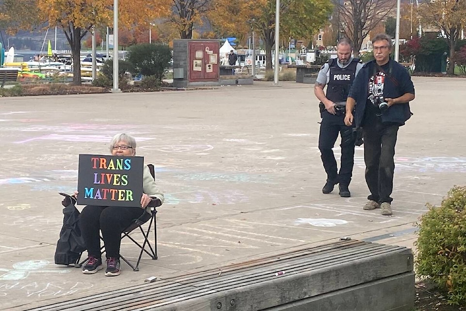 Person holds a “Trans Lives Matter” sign at Saturday’s rally. (Jen Zielinski/ Black Press Media) 
