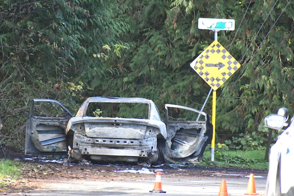 A car was found burned at the corner of 229th Street and 68th Avenue soon after the shooting Thursday, Oct. 26, 2023. (Heather Colpitts/Langley Advance Times) 