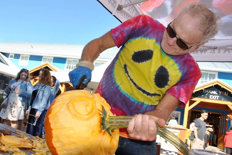 In addition to the B.C. pumpkin weighing competition Saturday, Oct. 7, at Krause Berry Farms, the event also featured demonstrations by acclaimed  carver Bruce Waugh. Known for his creations featuring sand and ice, he gets a kick out of also carving pumpkins. (Roxanne Hooper/) 