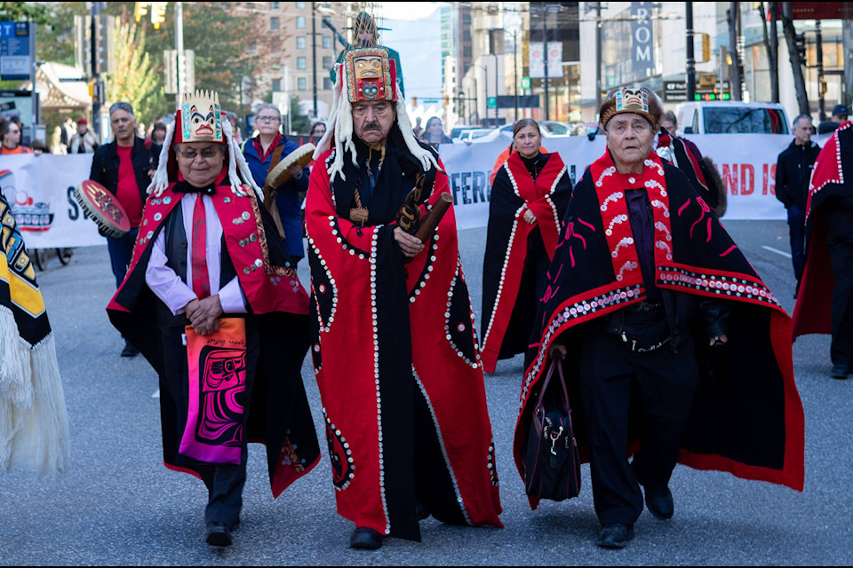 Members of the Gitxsan Huwilp Government march down Vancouver streets in protest of the RCMP’s C-IRG program (Gitxsan Photo Upload) 