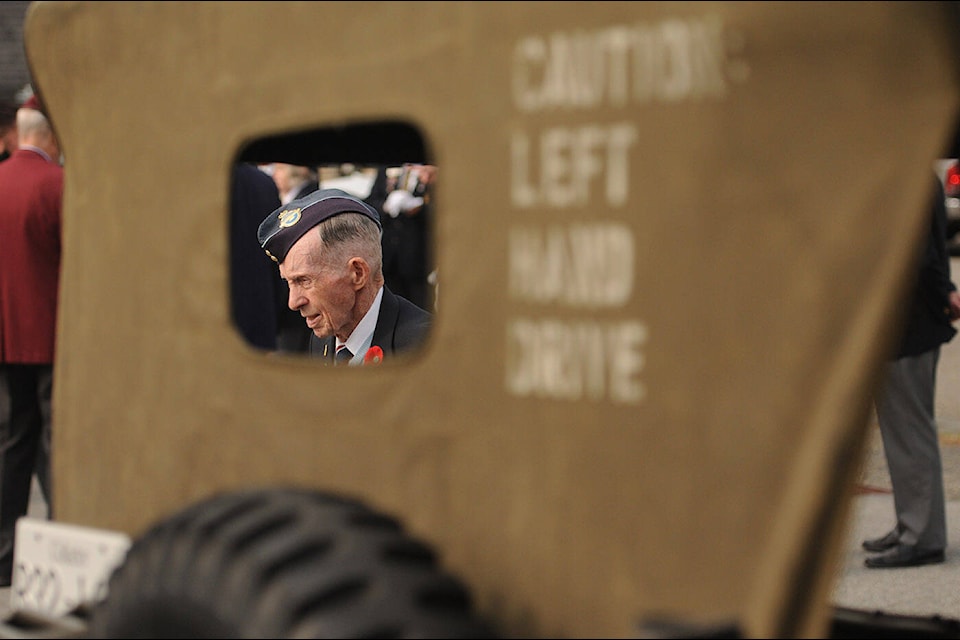 Second World War veteran Bernie McNicholl is seen through the window of a 1944 GPW quarter-ton truck during the closing of the legion ceremony at the Royal Canadian Legion Branch 4 on Mary Street on Friday, Sept. 10, 2021. (Jenna Hauck/ Chilliwack Progress file) 