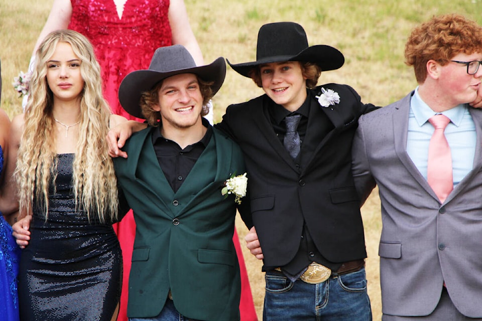 Mason Pincott and Reichert Sanford wore their best cowboy duds for the 2023 grad parade. (Patrick Davies photo - 100 Mile Free Press) 