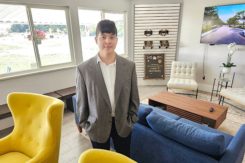 Shawn Carbonell, family service planner, seen here in the waiting room at Bakerview Memorial Cemetery in Aldergrove, says when people get past their anxiety about pre-planning their funeral, they always feel better. (Dan Ferguson/Langley Advance Times) 