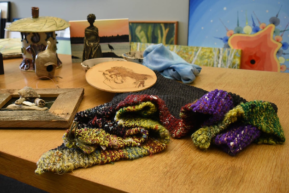 Silent auction items for the upcoming Cork and Canvas event at the Grove Art Gallery include textiles, sculptures, glass and wood art in addition to paintings. Cork and Canvas takes place Thursday, Nov. 9 at The Grove, starting at 6:30 p.m. (SUSAN QUINN/ Alberni Valley News) 