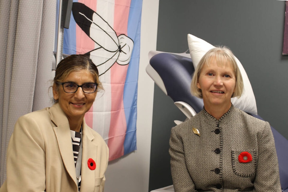 Neeraj Grewal, centre manager, with Heather Brazier, Victoria Youth Clinic board chair, at the new Foundry Victoria location on Yates Street. (Ella Matte/News Staff) 