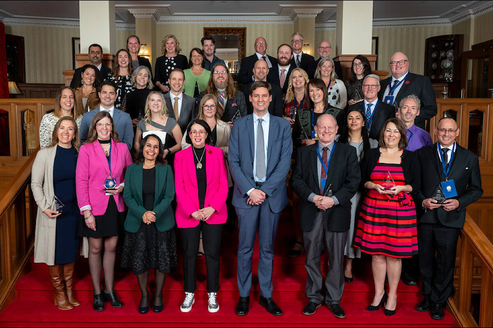 Premier David Eby posed with all 34 recipients of the 2023 Premier Awards at Government House in Victoria on Oct. 26. Among them was Cowichan Valley’s Tanya Leech who is the head secretary for Mill Bay Nature School and was acknowledged and awarded for her outstanding support in a school community. (Submitted) 