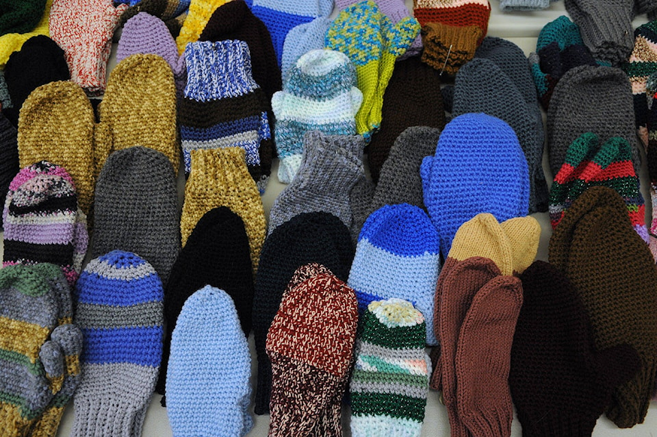 web1_231104-cpl-knitters-crocheters-made-mitts-hats-for-charity_4
