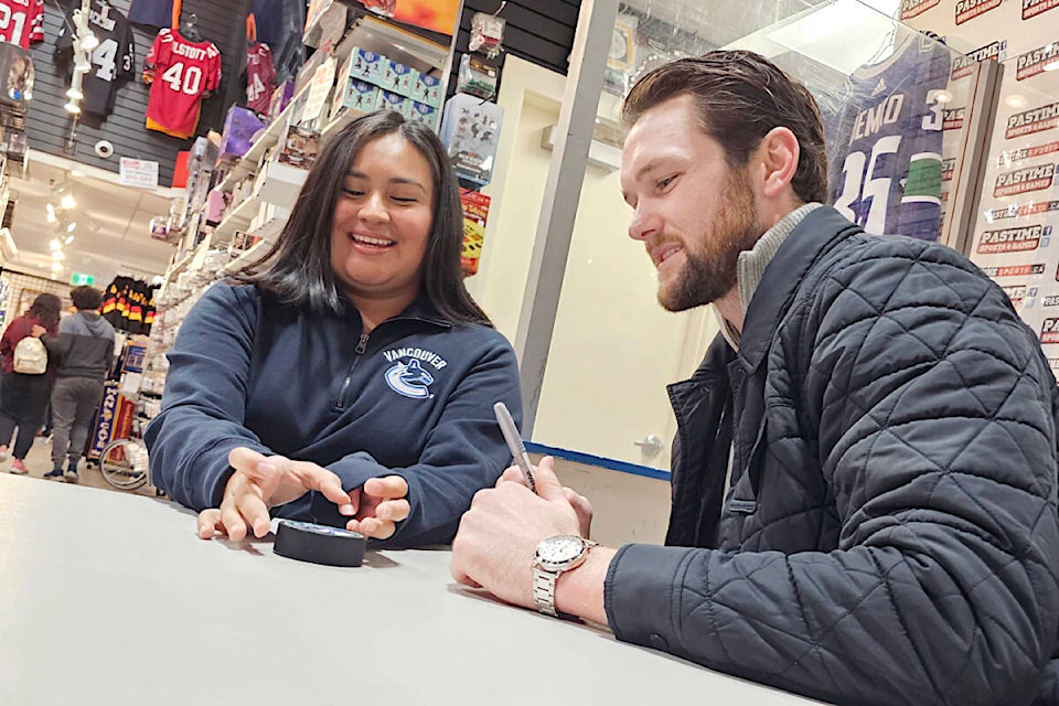 A day after his second shutout of the season, Vancouver Canucks goaltender Thatcher Demko was signing a puck at 91ԭ’s Pastime Sports and Games on Sunday, Nov. 5, for one of several hundred fans. It was the store’s grand opening of its new location and 30th anniversary celebration. (Dan Ferguson/91ԭ Advance Times) 