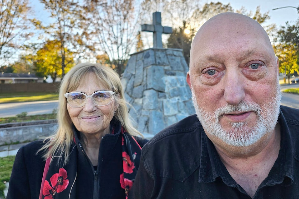 Vivian Lillico and Owen Burdett stand at the cenotaph outside the Royal Canadian Legion Branch at 26607 Fraser Hwy. where a plaque will be dedicated in memory of local soldiers. (Dan Ferguson/91ԭ Advance Times) 