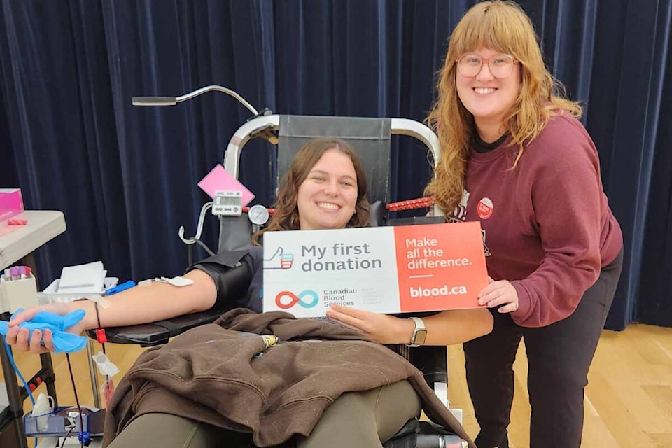 Hazel Bice (seated) and Jenn Lund were two first-time donors at the Comox Valley Kickers’ blood drive. Photo by Natalie Nguyen 