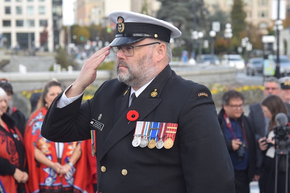 Petty Officer 1st Class Steve Morrison salutes during an Indigenous Veterans Day ceremony Wednesday (Nov. 8) at the cenotaph at the B.C. legislature. (Brendan Mayer/News Staff) 