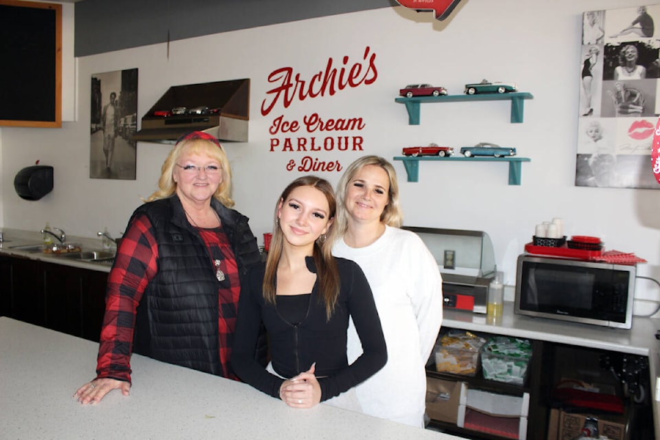 Julie, Jaida and Jenn Stevens at the Archie’s Ice Cream Parlour and Diner counter. (Photo by Don Bodger) 