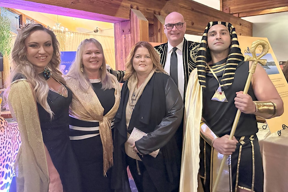 Sources Foundation director and gala co-chair Paul Cope (second from right) poses with fellow gala attendees. (Contributed photo) 