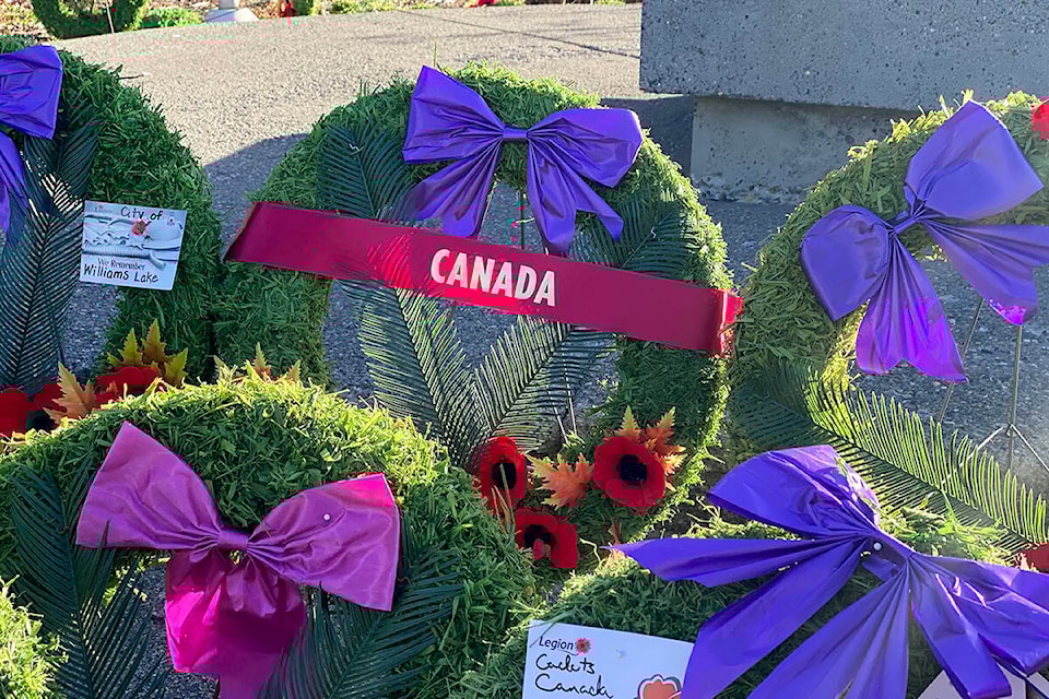 Wreaths lay at the base of the Cenotaph outside Williams Lake City Hall Nov. 11. (Angie Mindus photo - Efteen) 