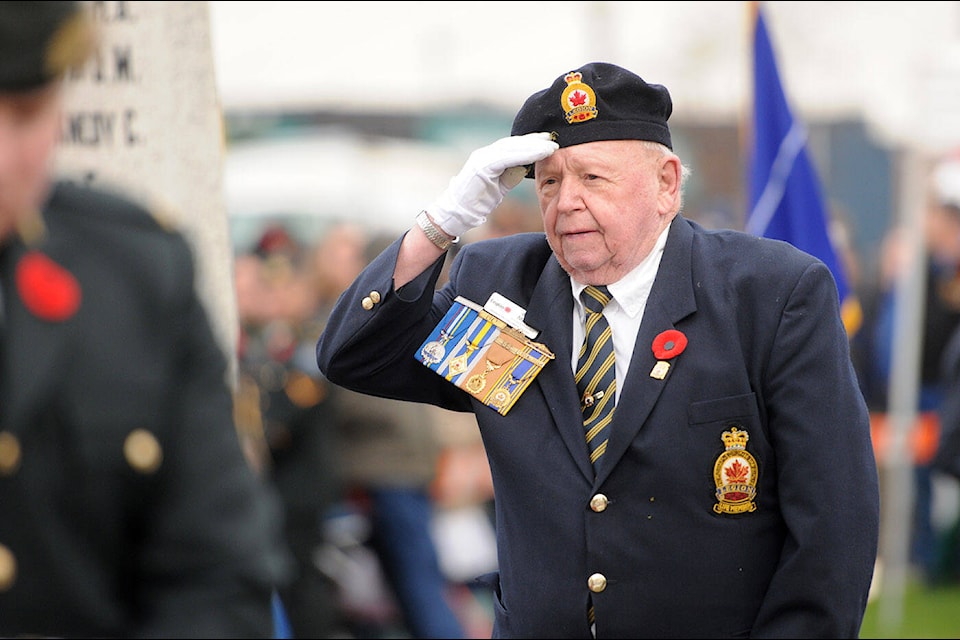 Veteran Al McFee salutes during the Remembrance Day ceremony at Veterans’ Memorial Park in downtown Chilliwack on Nov. 11, 2023. (Jenna Hauck/ Chilliwack Progress) 