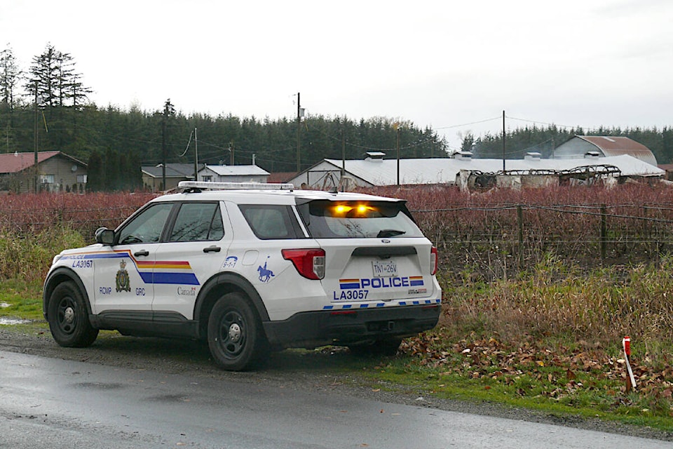  Saturday, police were still at the scene of a fire in the 23500 block of 0Avenue in Langley that drew a massive police response Friday night, Nov. 10. (Dan Ferguson/Langley Advance Times) 