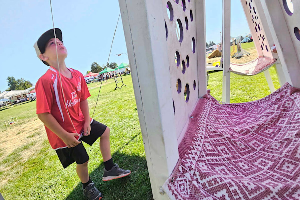 Mason, 9 from Aldergrove, tried his hand at a classic game in the Kids Zone at the 2023 Aldergrove Fair. (Langley Advance Times files) 