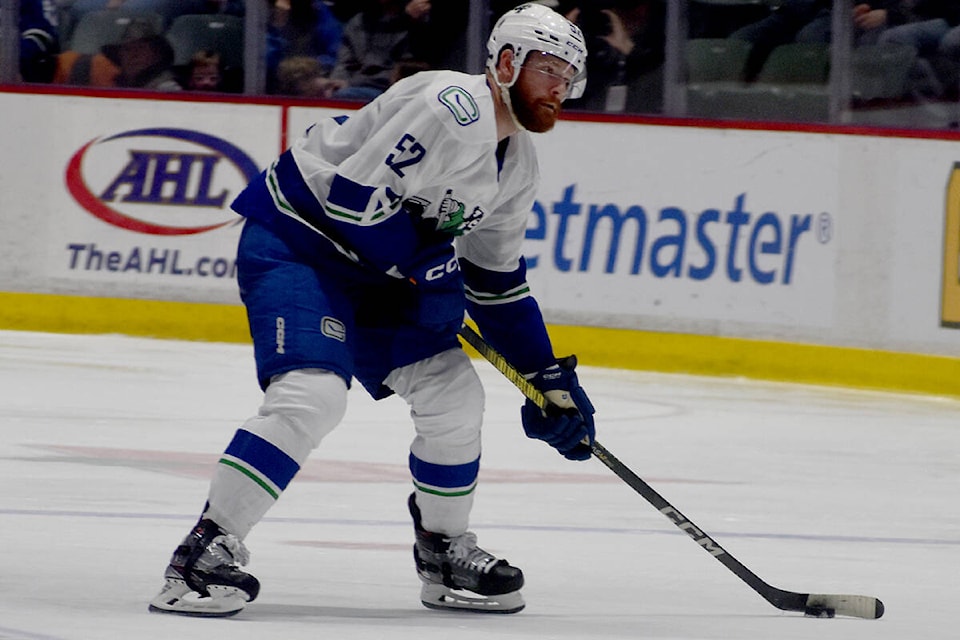 Abbotsford Canucks defenceman Matt Irwin plays the puck against the Henderson Silver Knights on Nov. 4. (Ben Lypka/Abbotsford News) 