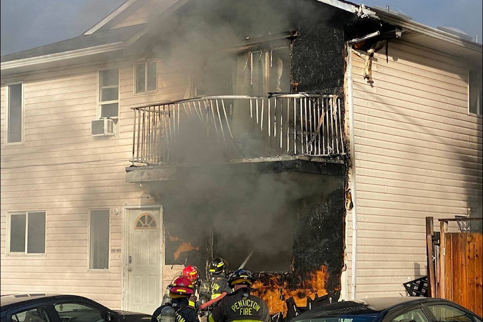 A house on Burns Street caught on fire on Saturday, Nov. 11. (Logan Lockhart/Penticton Western News) 