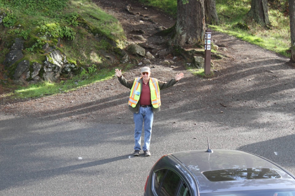 Side angle of Darrell Wick standing where the PKOLS (Mount Douglas) communication tower could be constructed. (Ella Matte/News Staff) 