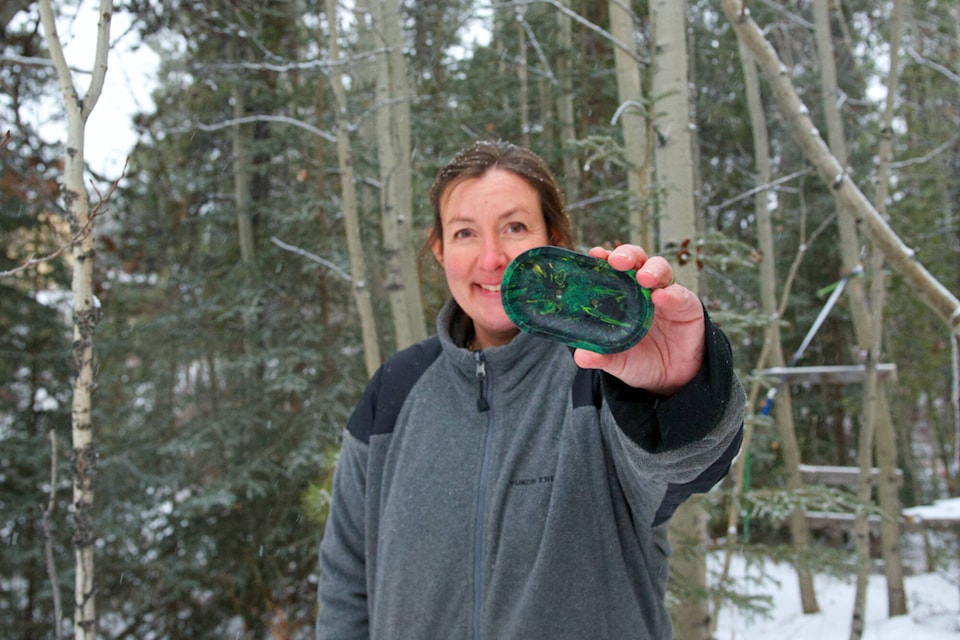 Yukon Plastics co-founder Janna Swales holds a soap dish made from waste plastic. The company currently produces two items for sale: soap dishes and rings, although other products are coming down the pipe. (Matthew Bossons/Yukon News) 