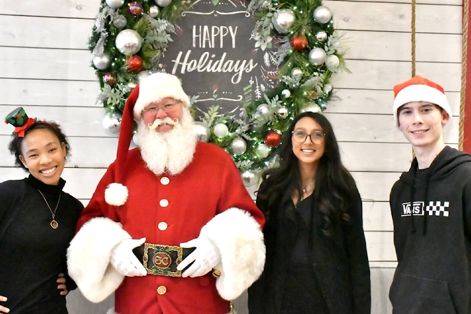 Santa and his helpers were at Willowbrook mall for the annual charity shopping night on Tuesday, Nov. 21.  (Photos by Kyler Emerson/91ԭ Advance Times) 