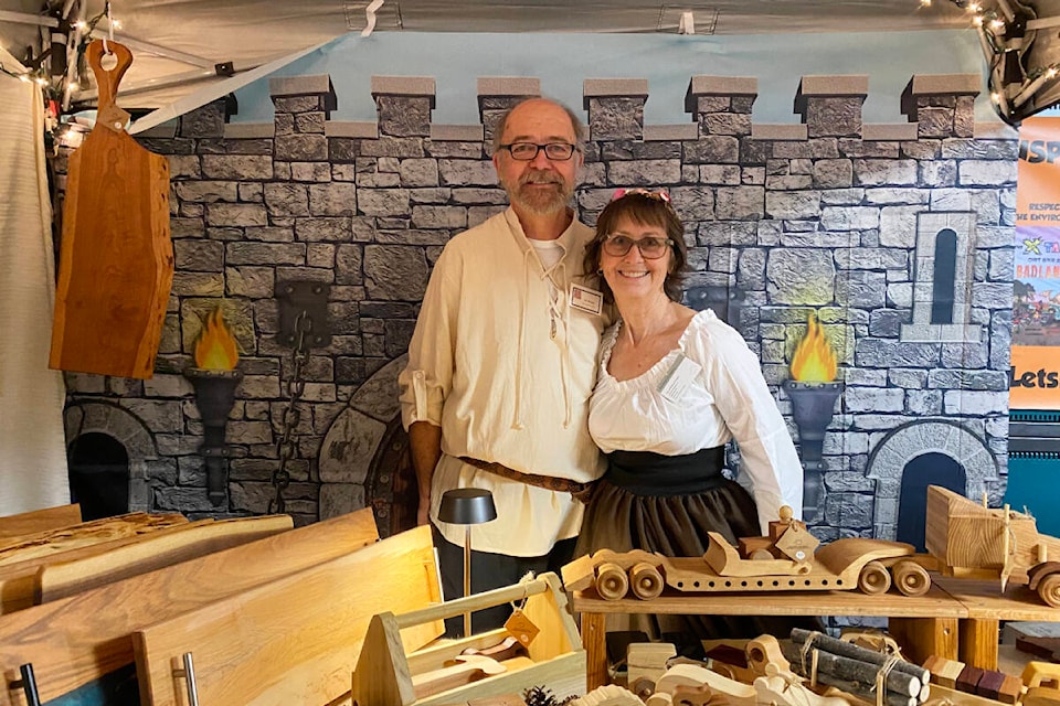 Jim and Sherry Hedges of Tiny Timber Toy Company have been selling their toys at the Medieval Market for 3 years. (Kim Kimberlin photo - Williams Lake Tribune) 