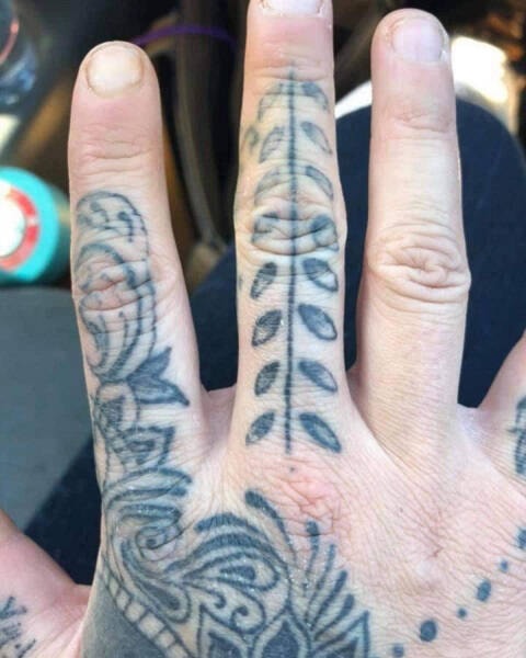 The missing woman has tattoos on her hands, neck, torso and back. 