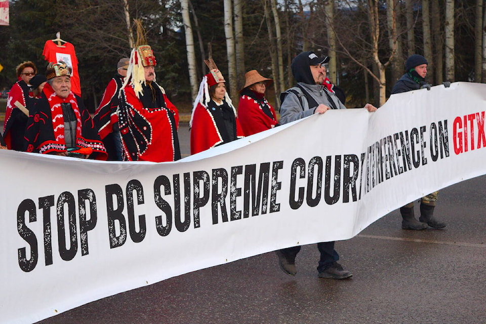 Gitxsan members and their allies block Highway 16 in protest of the RCMP’s C-IRG program. (Morgan Powell/Interior News)  