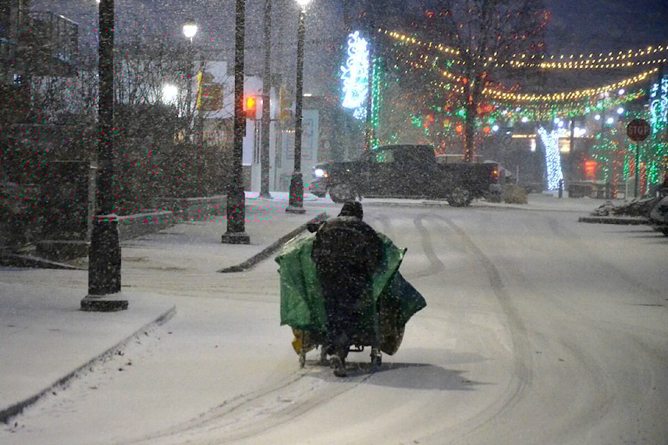 web1_221130-lat-mc-homelessinsnowc