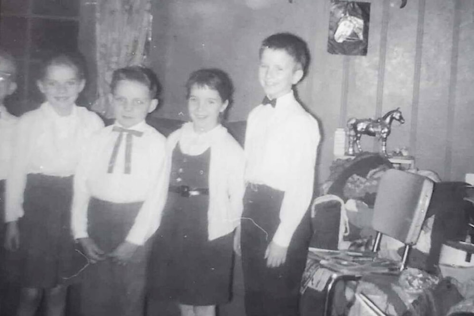 Loren Buckle, right, in 1962, along with other students Monty, Iris, Glenn and Diane, getting ready to go to the Christmas concert at the Riske Creek community hall. (Buckle family photo collection) 