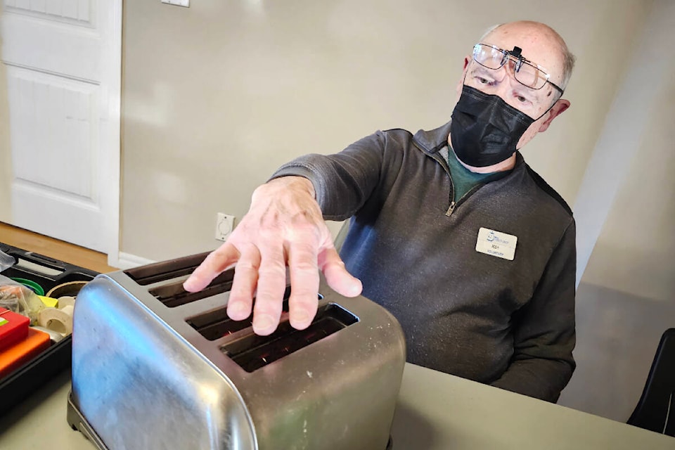 Volunteer Rob Hollins checked a toaster for heat at the third LEPS repair cafe, held in in the Firehouse Cafe, at the Aldergrove Community Station House, on Nov. 25. The cafes will continue next year, thanks to a VanCity grant. (Dan Ferguson/91ԭ Advance Times) 